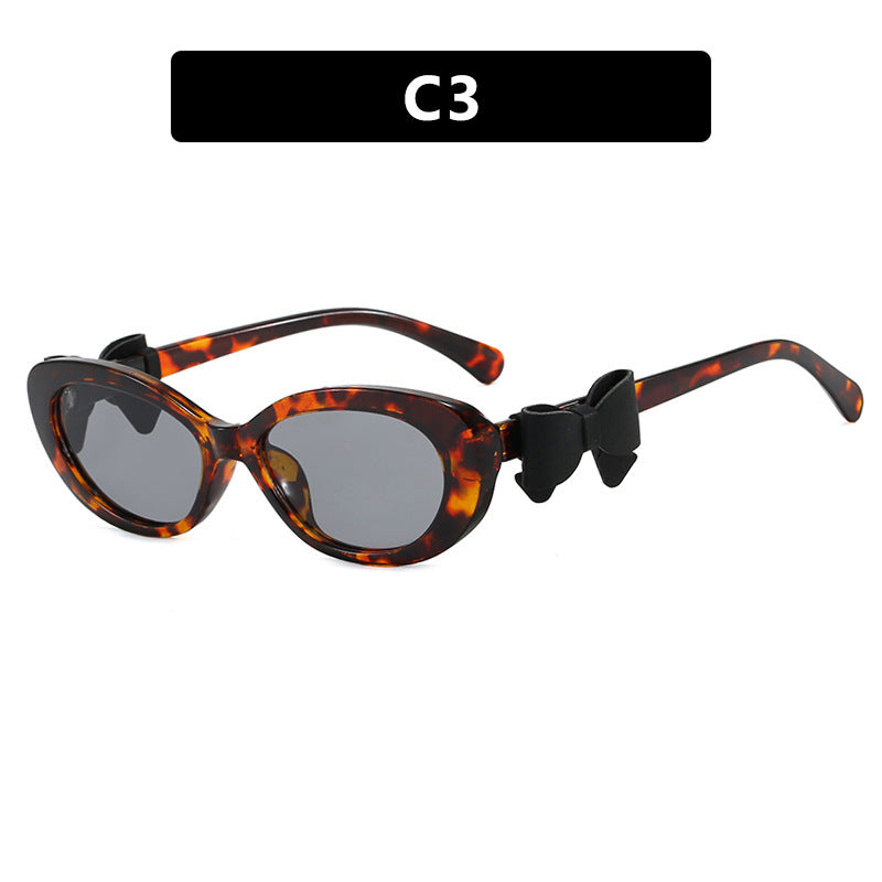 Damen modische Sonnenbrille mit verspieltem Schleifen-Design Karnz