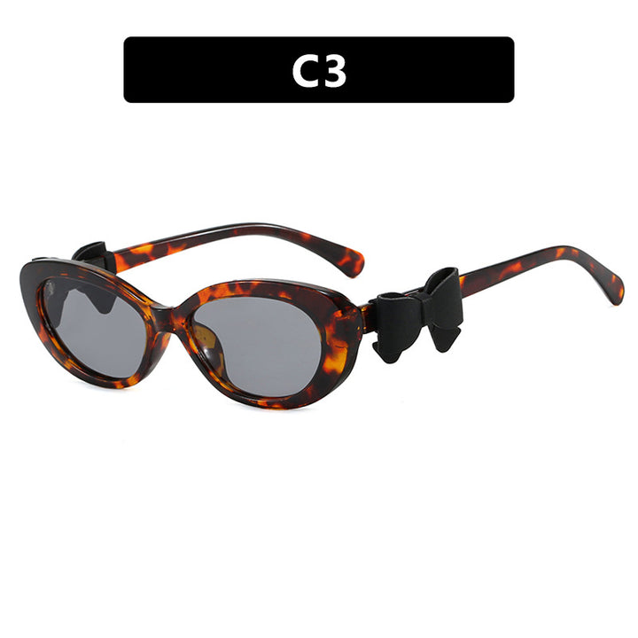 Damen modische Sonnenbrille mit verspieltem Schleifen-Design Karnz