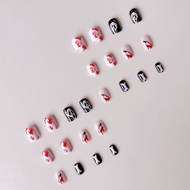 Kreatives Halloween Kunstnagelset mit gruseligen Motiven und funkelnden Akzenten Karnz