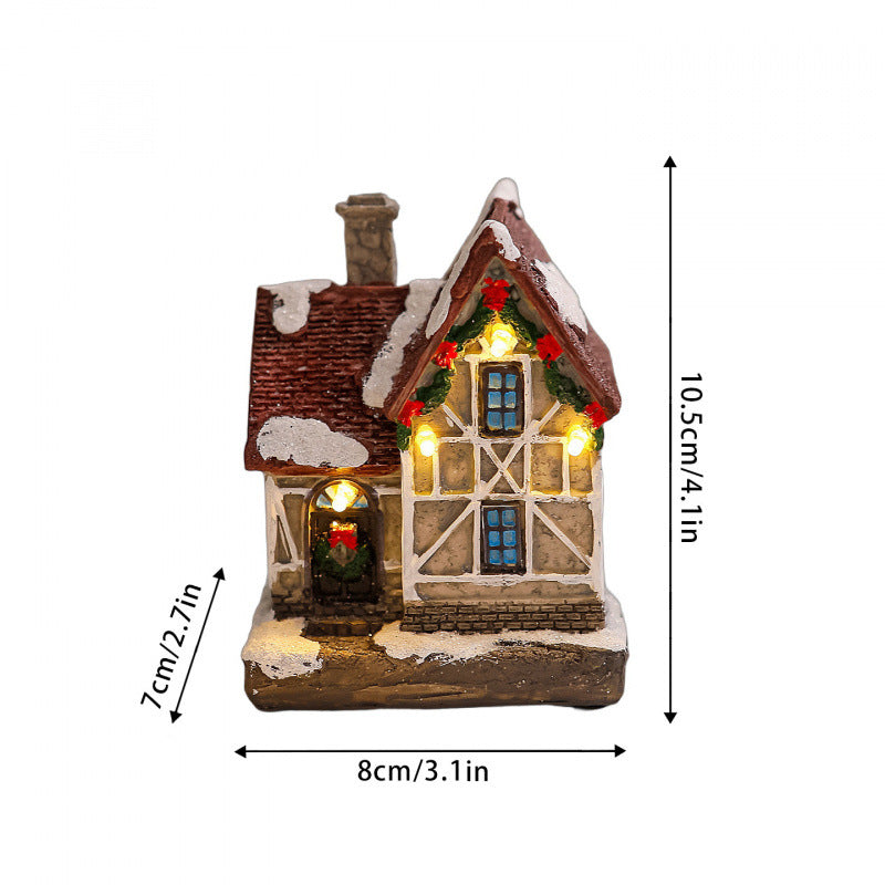 Dekoratives Weihnachtsdorf mit Lichtern Karnz