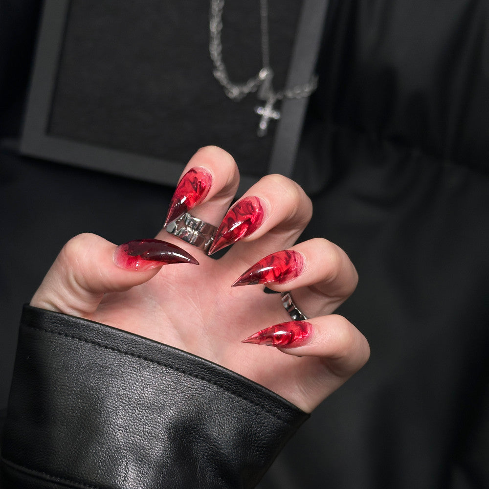 Künstlerische Stiletto Press-On Nagelverzierungen
