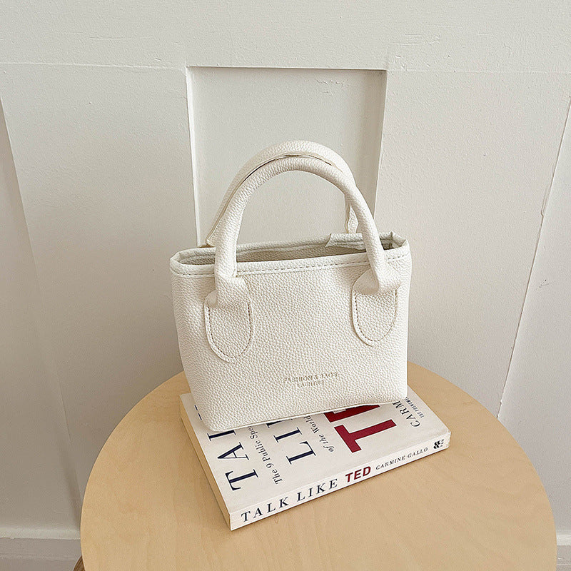 Elegante Texturierte Lederhandtasche