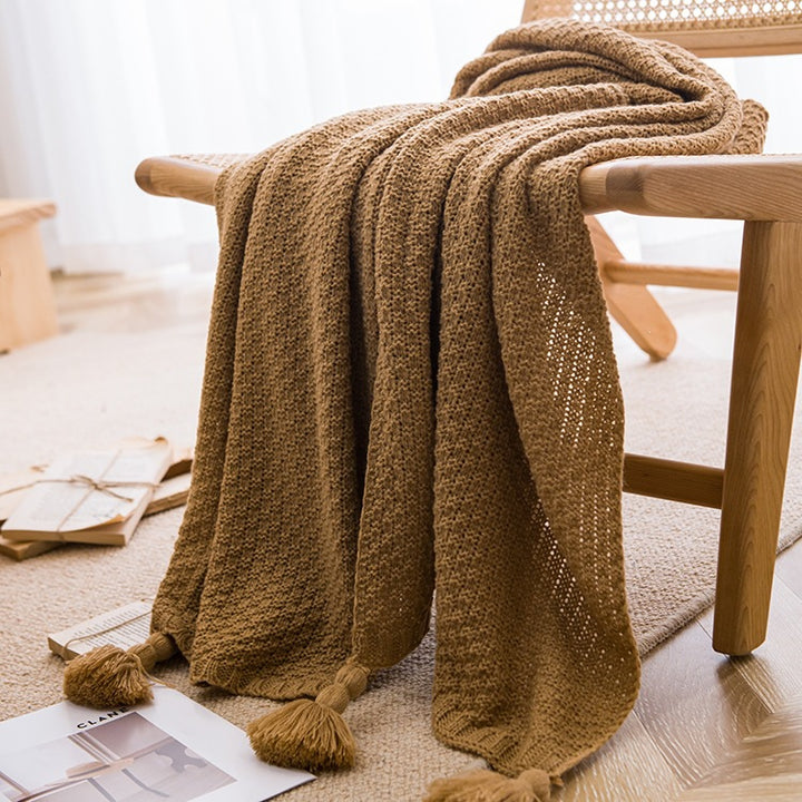 Strukturierte Strickwurfdecke