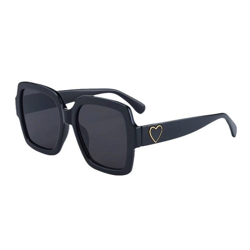 Damen Modische Sonnenbrille mit exklusivem Herz-Detail Karnz