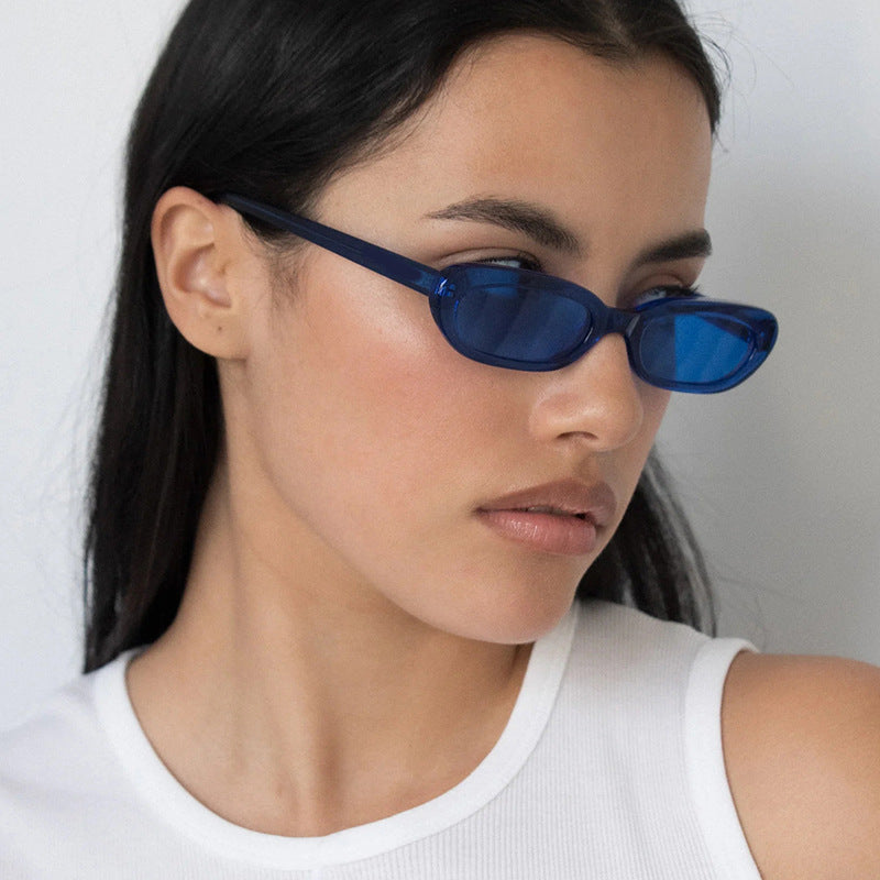 Damen modische Katzenaugen-Sonnenbrille mit transparentem Kunststoffrahmen und UV-Schutz Karnz