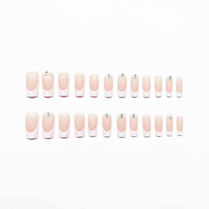 Elegantes Kunstnagelset mit Hochglanz-Finish und Strassverzierungen Karnz