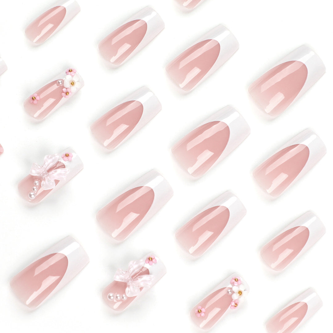 Kunstnagelset mit romantischen 3D-Blüten und Schleifenverzierungen Karnz