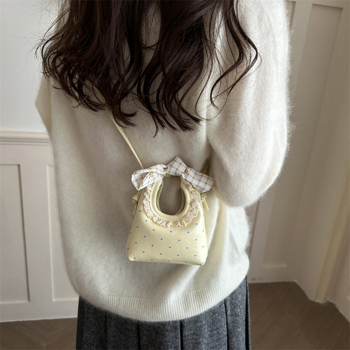 Charmante Mini-Handtasche mit Schleifenakzent