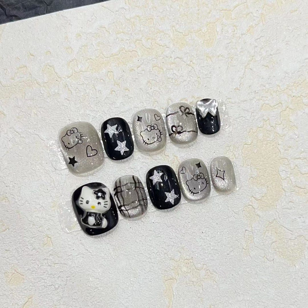 Spaß und verspieltes Press-On Nail Set mit Cartoon-Accents Karnz