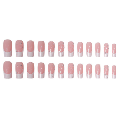 Kunstnagelset mit exquisiten Perlenakzenten und transparentem Design Karnz