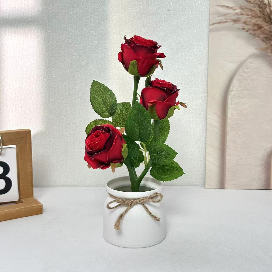 Lebensgetreue dekorative Blumenarrangement