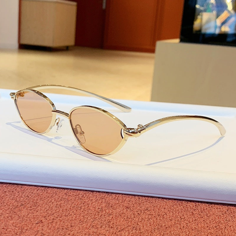 Damen Designer-Sonnenbrille mit elegantem Metallgestell und schützenden Gläsern Karnz