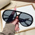 Damen Sonnenbrille im extravagantem Design mit markanten Gläsern Karnz