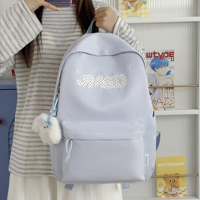 Trendy lässiger Tagesrucksack mit süßem Charakterakzent Karnz