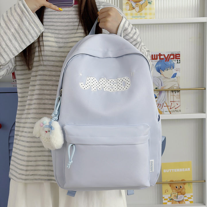 Trendy lässiger Tagesrucksack mit süßem Charakterakzent Karnz