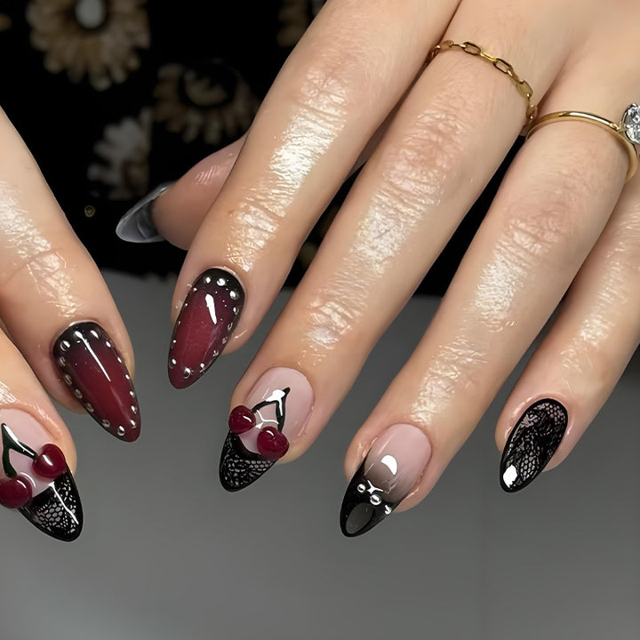 Kunstnagelset mit verspielten Frucht- und Blumendesigns Karnz