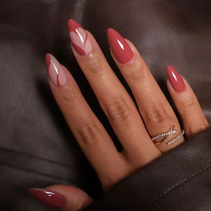 Elegante Stiletto Press-On Nägel mit künstlerischem Grafikdesign Karnz