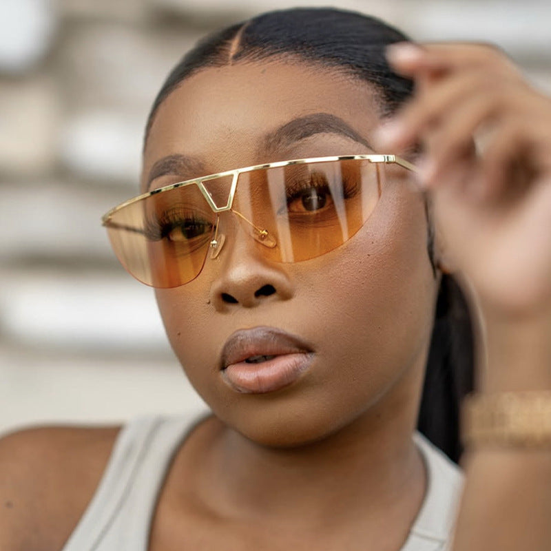 Damen futuristische Sonnenbrille mit schützendem Metallrahmen Karnz