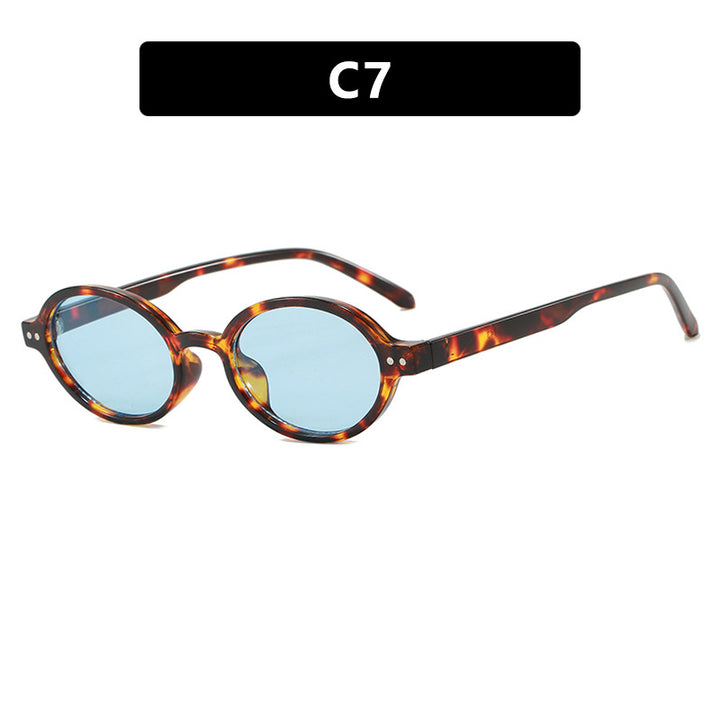 Damen modische ovalförmige Sonnenbrille mit ausgefallenem Rahmen Karnz
