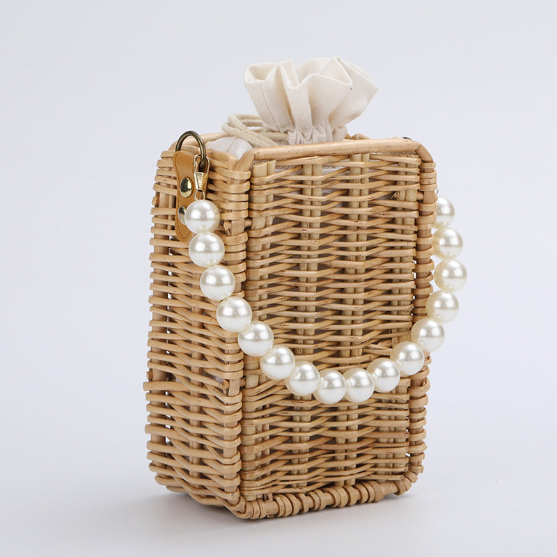 Damen Handtasche aus geflochtenem Material mit Perlenakzenten Karnz
