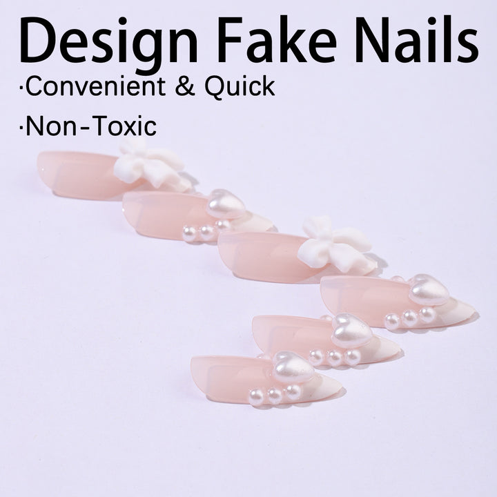 Kunstnagelset mit eleganten Perl- und Schleifenverzierungen Karnz