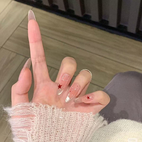 Elegante mit Sternen verzierte Nagelverlängerungen Karnz