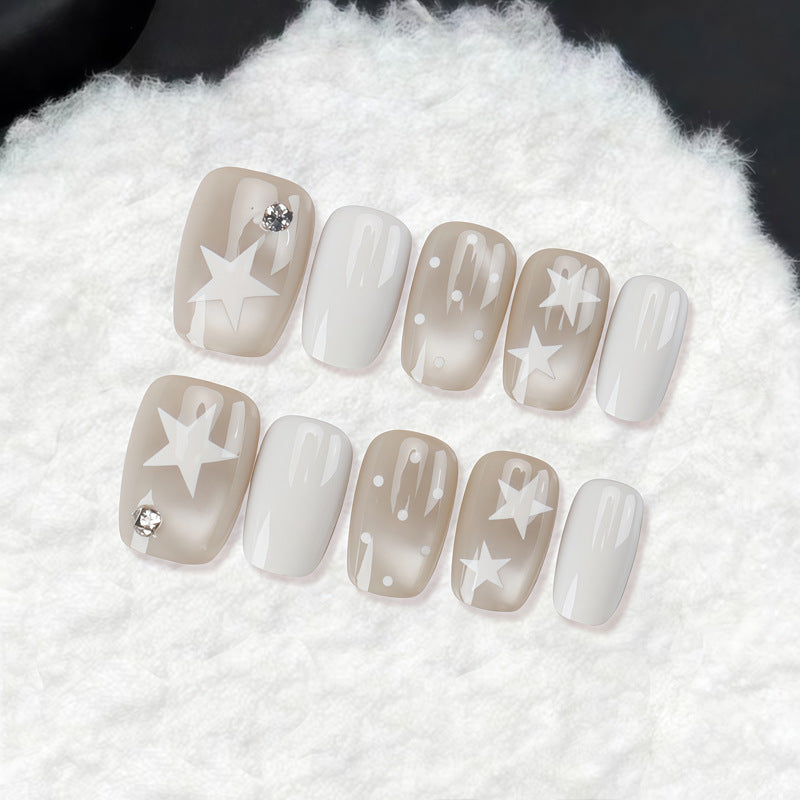 Dekoratives Press-On-Nagelset mit Stern- und Schleifenmotiven Karnz