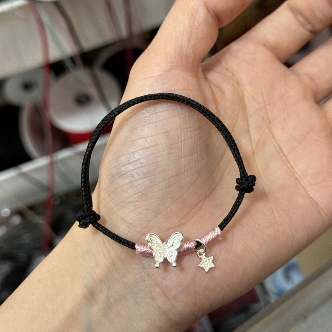 Schmetterlingsanhänger geknotetes Armband Karnz