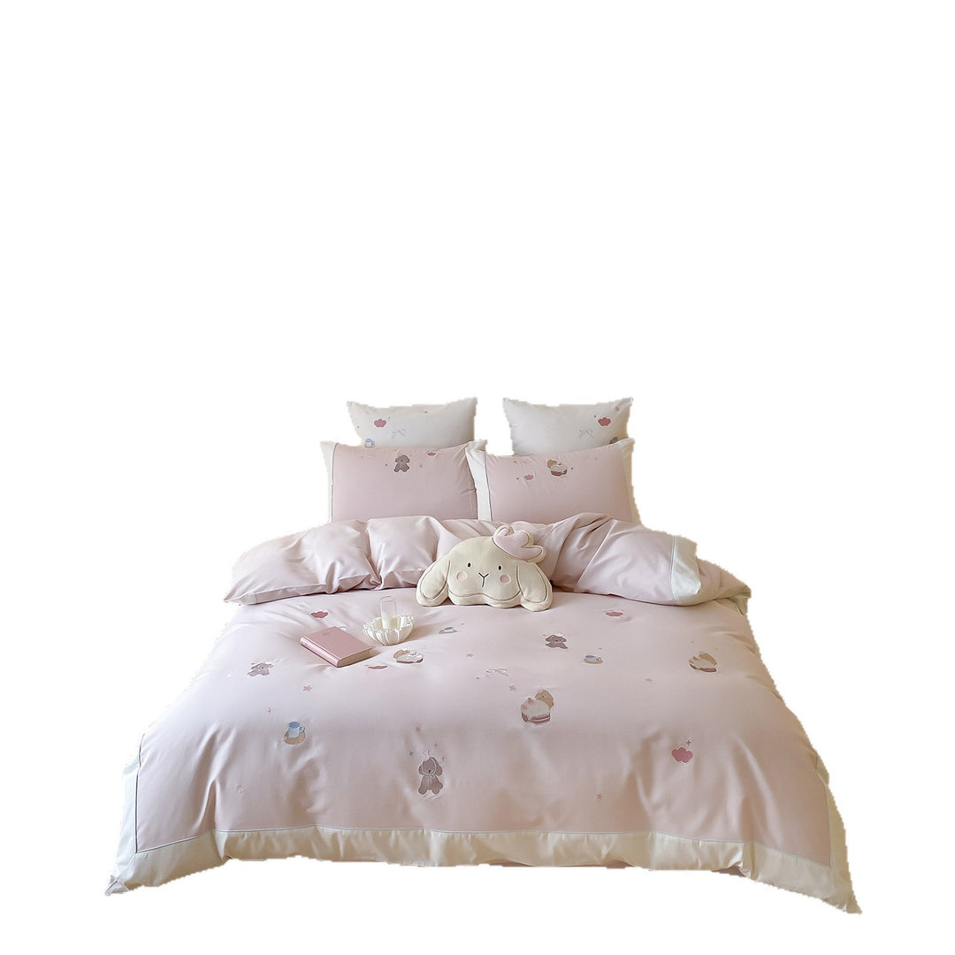 Rosa Baumwollbettbezugset mit gestickten Tiermotiven und Kontrastbordüre