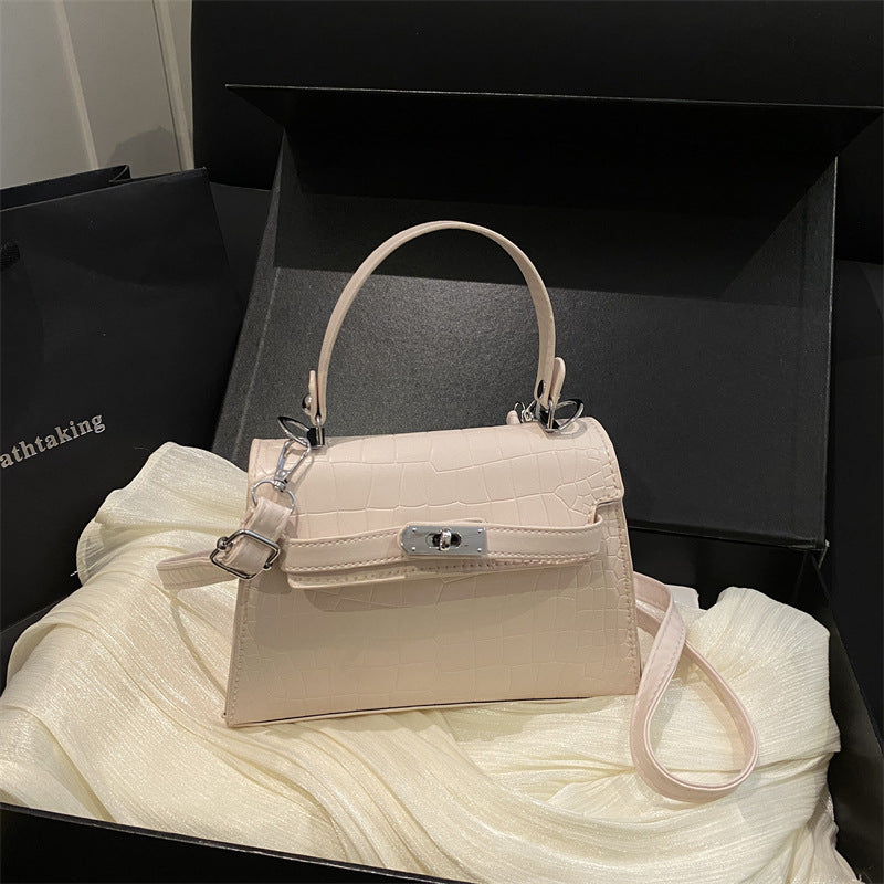 Elegante krokodilgeprägte Handtasche