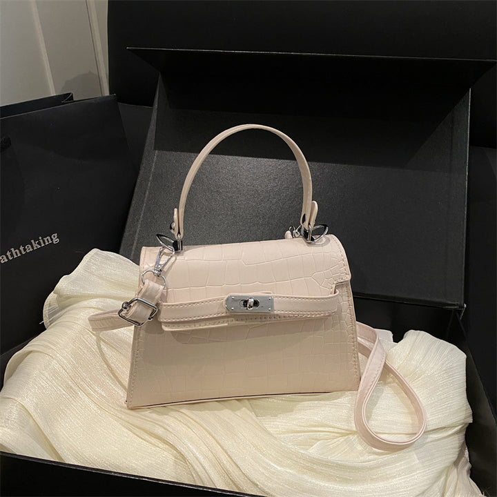 Elegante krokodilgeprägte Handtasche