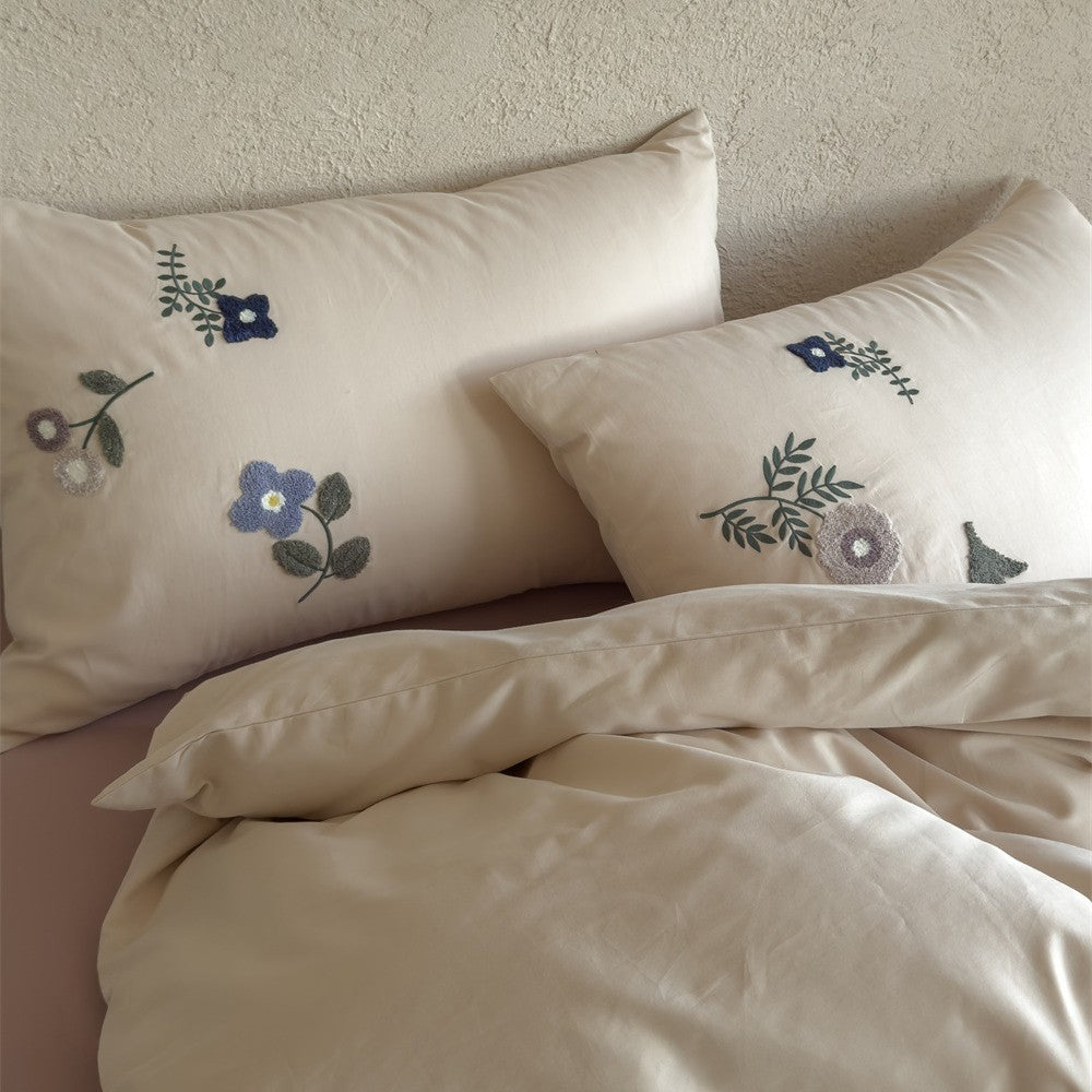 Bettwäsche-Garnitur aus Baumwollsatin mit floraler Stickerei