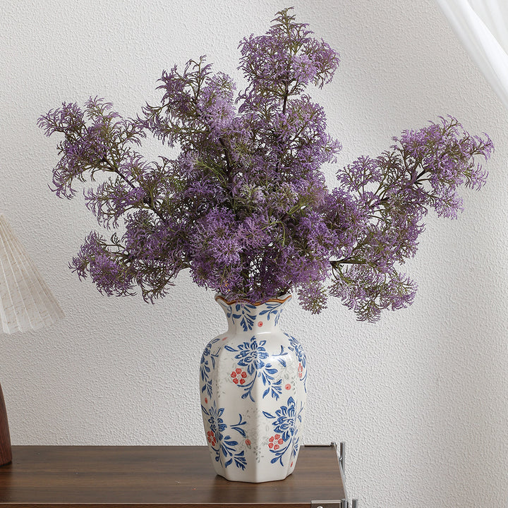Künstlicher Blütenzweig mit filigranen lila Blüten Karnz