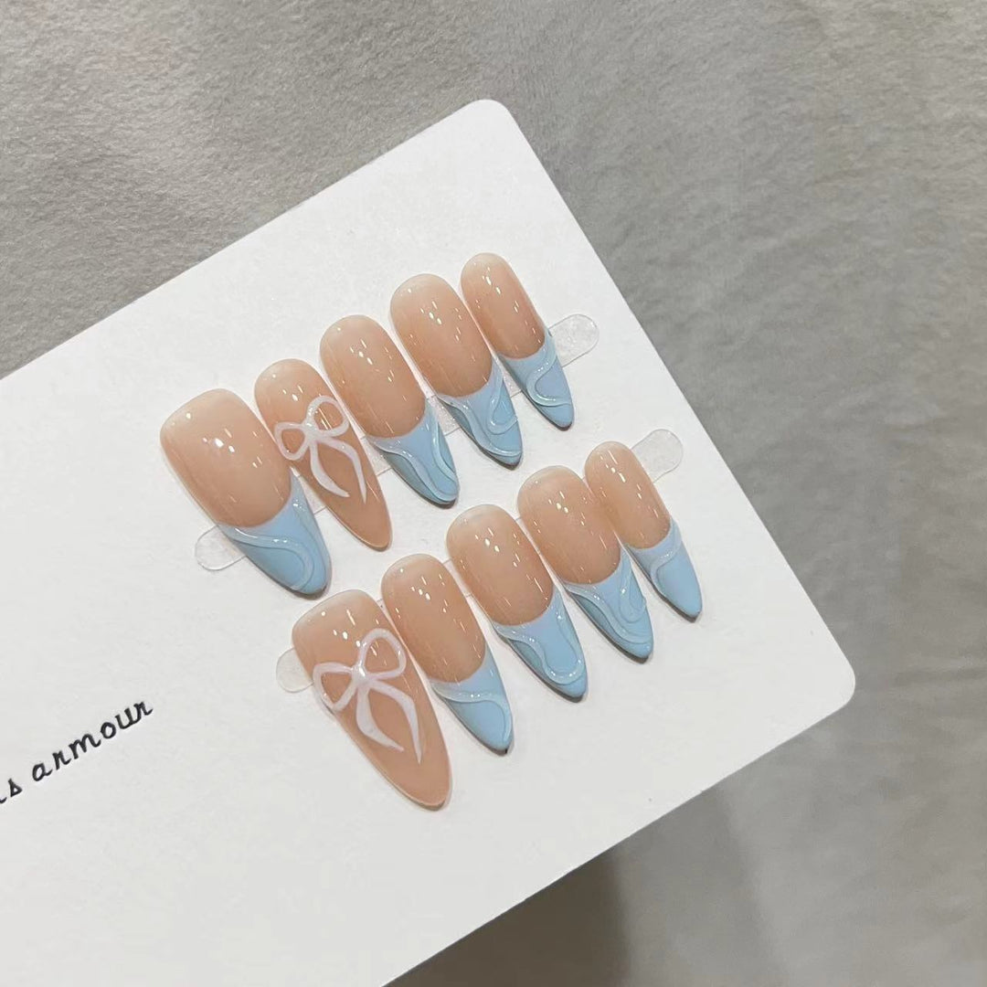 Dekoratives Press-On-Nagelkunst-Set mit charmantem Schleifen-Design Karnz
