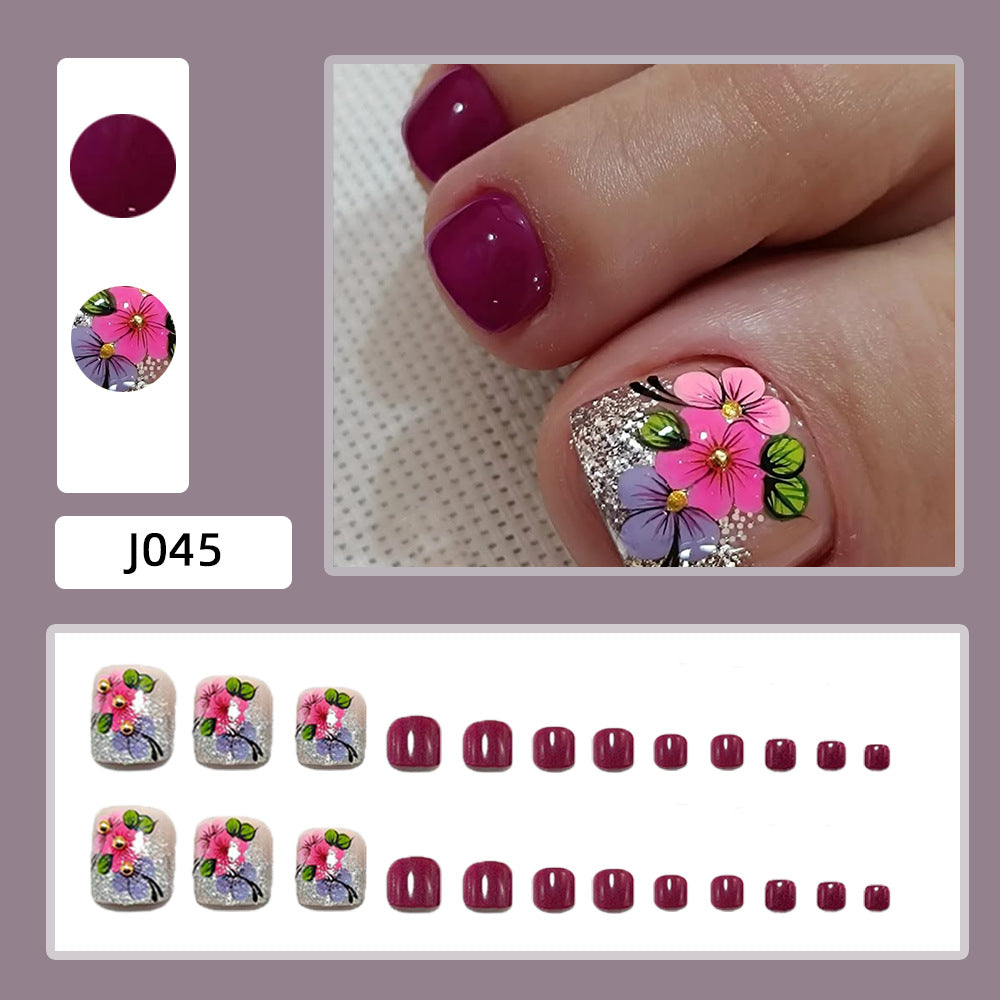 Kunstnägel mit Floralen Designs und Glitzereffekten Karnz
