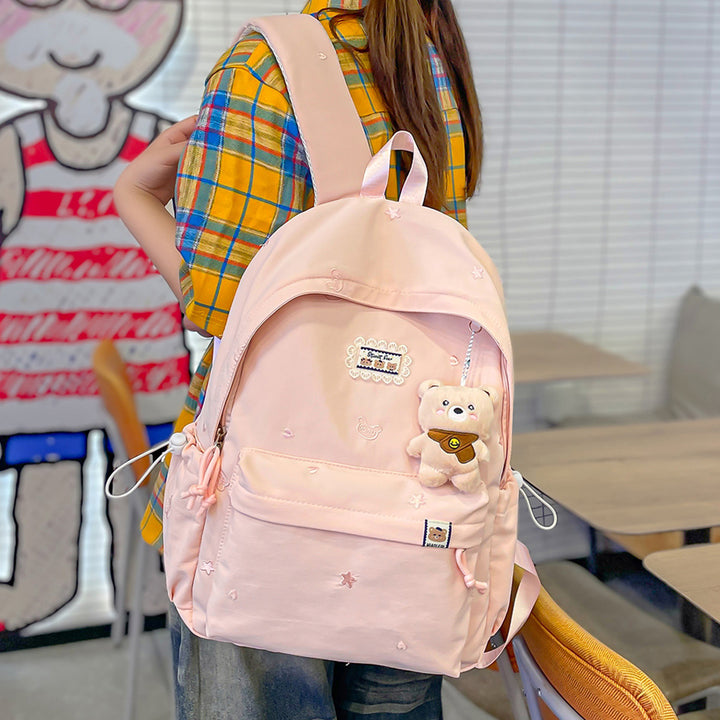 Stylischer backpack mit floralem Schmuck Karnz