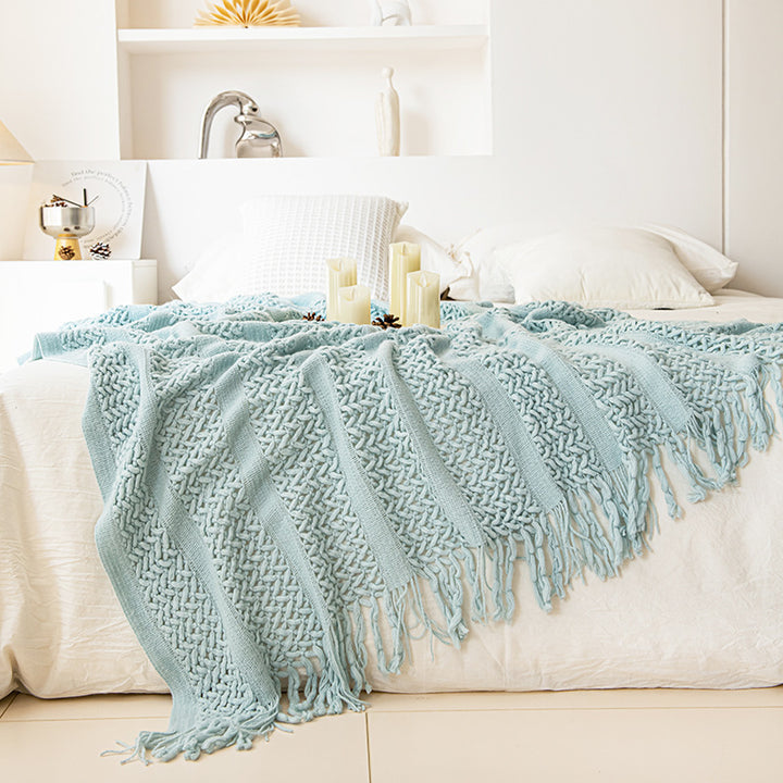 Gemütliche Strickwurfdecke