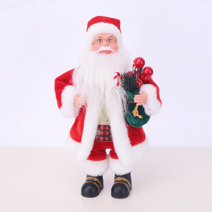 Dekorative Weihnachtsmannfigur mit Süßigkeit
