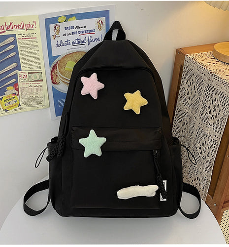 Niedlicher verspielter Rucksack mit Stern-Applikationen