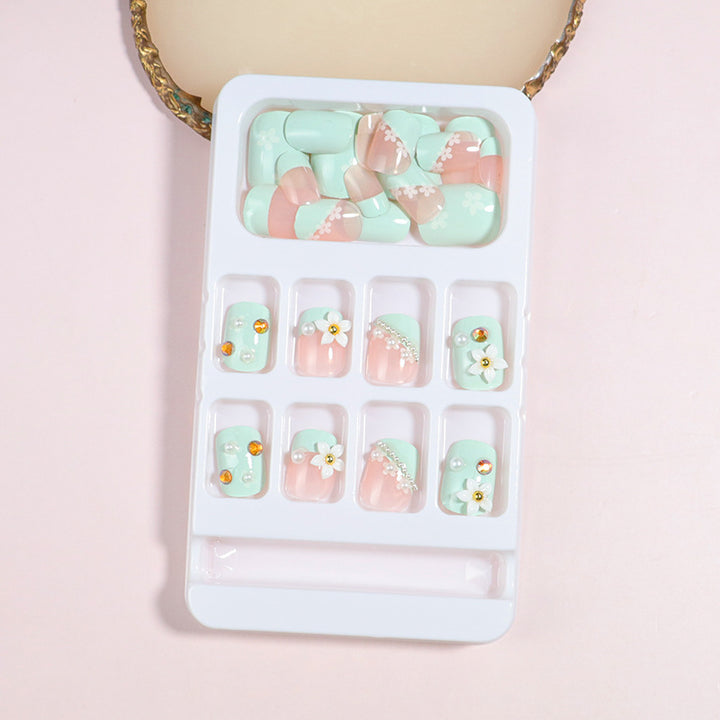 Dekorativer Press-On Nail Art Set mit Schleifenakzenten Karnz