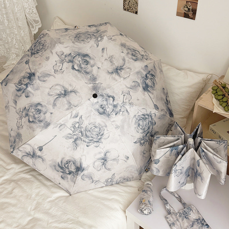 Damen Faltbarer Regenschirm mit floralen Motiven und Tragetasche Karnz