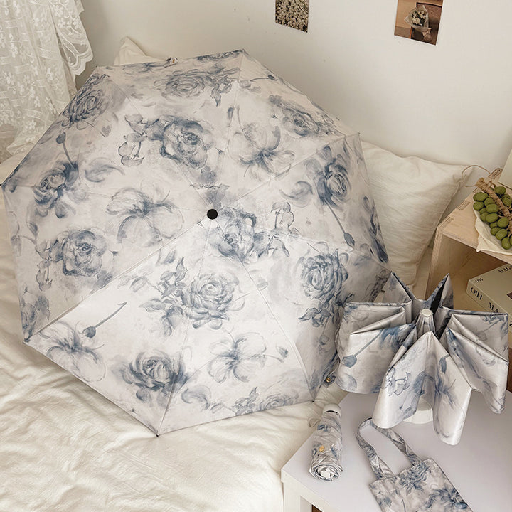 Damen Faltbarer Regenschirm mit floralen Motiven und Tragetasche Karnz