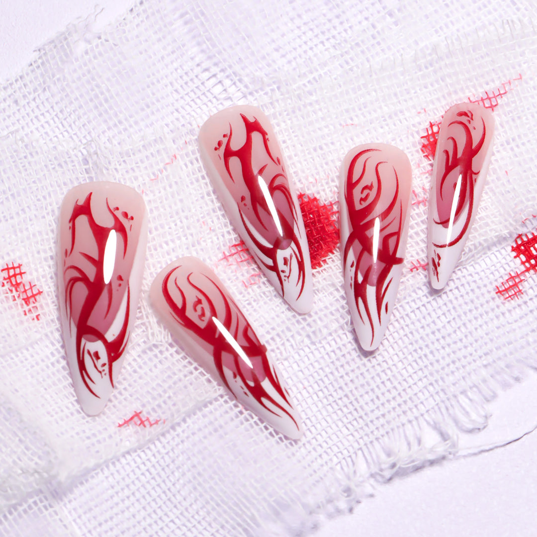 Kunstvolle Stiletto-Nägel mit künstlerischem Farbverlauf Karnz