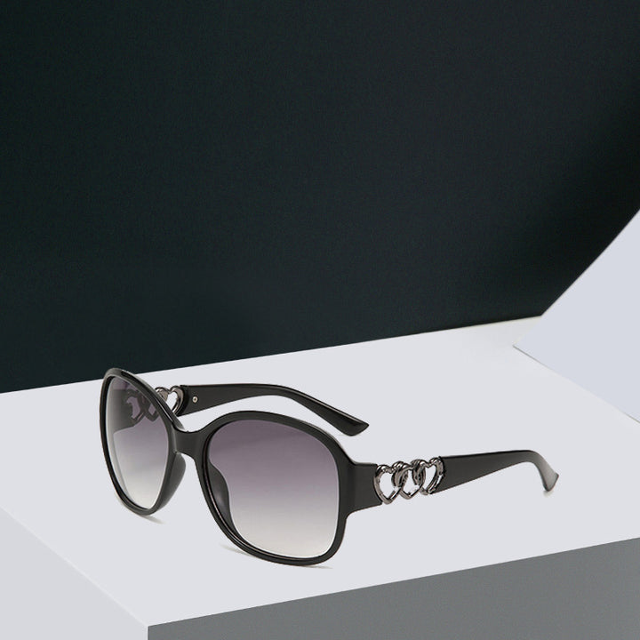 Damen elegante Sonnenbrille mit exquisite Rahmenverzierung Karnz