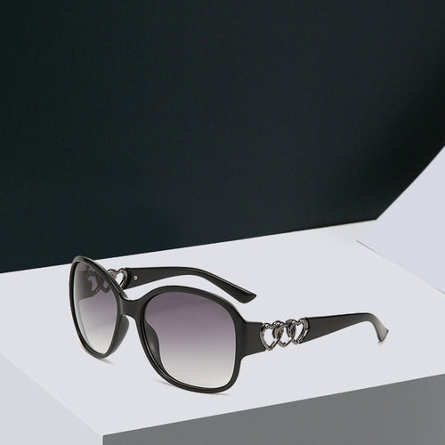 Damen elegante Sonnenbrille mit exquisite Rahmenverzierung Karnz