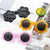 Damen Sonnenbrille im verspielten Blumenmuster Karnz