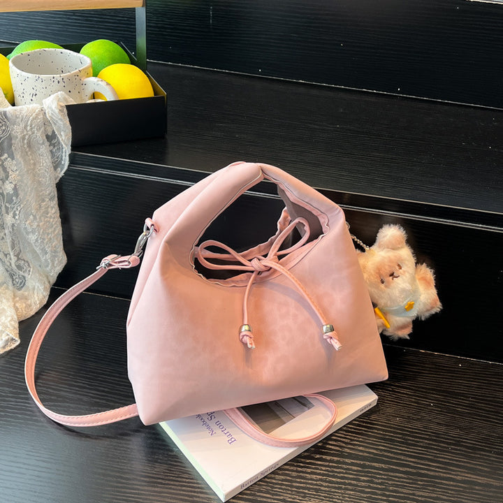 Stylische und funktionale Drawstring-Handtasche Karnz
