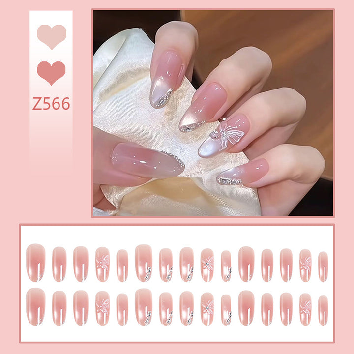 Kunstnagelset mit elegantem Ombre-Design und funkelnden Akzenten Karnz