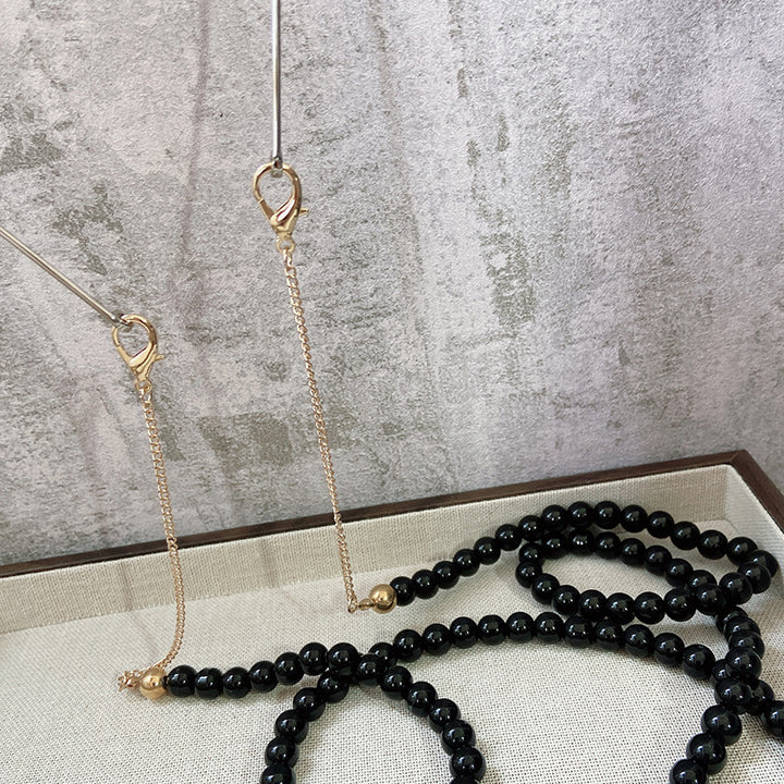 Modisches Schmuckband Aus Onyx-Perlen Karnz