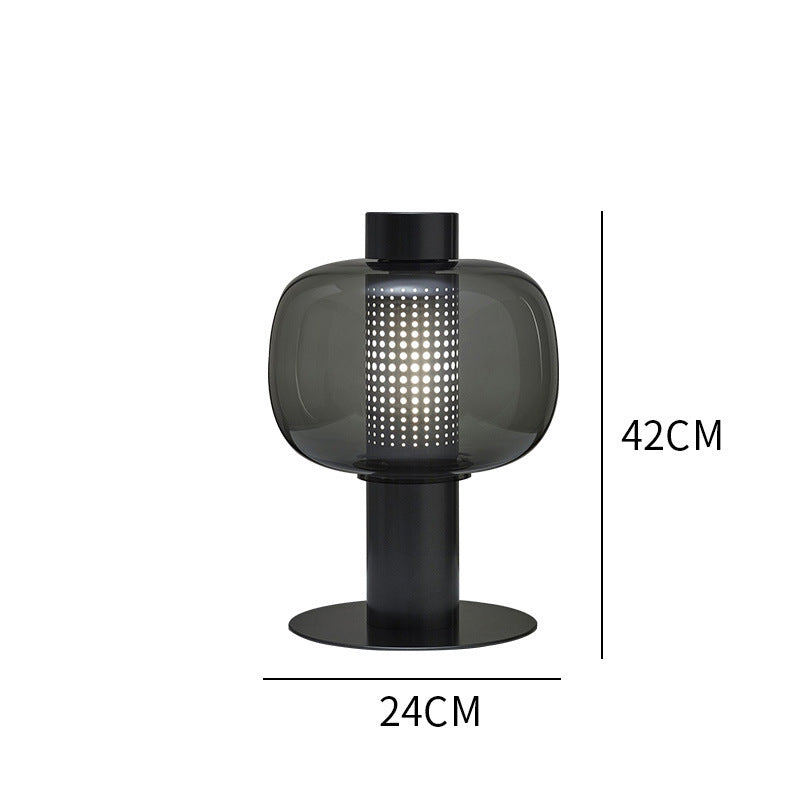 Künstlerische Tischlampe mit elegantem Glasschirm